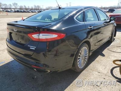 Trzecie zdjęcie samochodu z tyłu: 2016 FORD FUSION TITANIUM VIN:3FA6P0K90GR174829 - miniatura