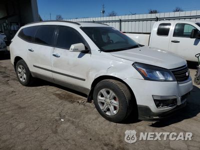 Czwarte zdjęcie samochodu z boku: 2017 CHEVROLET TRAVERSE LS VIN:1GNKRFKD4HJ296641 - miniatura