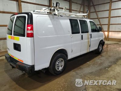 Trzecie zdjęcie samochodu z tyłu: 2015 CHEVROLET EXPRESS G2500 VIN:1GCWGFCF8F1193297 - miniatura