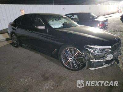 Czwarte zdjęcie samochodu z boku: 2018 BMW M550XI VIN:WBAJB9C55JG463848 - miniatura
