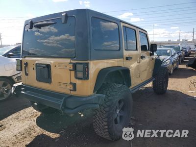 Trzecie zdjęcie samochodu z tyłu: 2013 JEEP WRANGLER UNLIMITED SAHARA VIN:1C4BJWEG6DL614750 - miniatura
