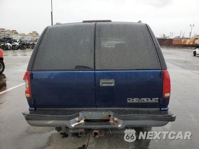 Zdjęcie 6 z 13 samochodu: 1999 CHEVROLET SUBURBAN C1500 VIN:3GNEC16R6XG254396 - miniatura