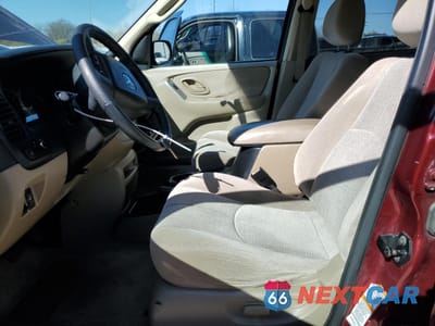 Zdjęcie 7 z 13 samochodu: 2003 MAZDA TRIBUTE LX VIN:4F2CZ94133KM29412 - miniatura