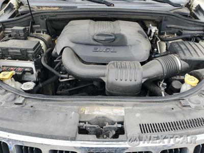 Zdjęcie 11 z 12 samochodu: 2011 JEEP GRAND CHEROKEE LAREDO VIN:1J4RR4GG3BC580623 - miniatura