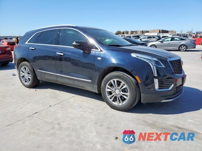 Czwarte zdjęcie samochodu z boku: 2021 CADILLAC XT5 PREMIUM LUXURY VIN:1GYKNCRS0MZ126161 - miniatura