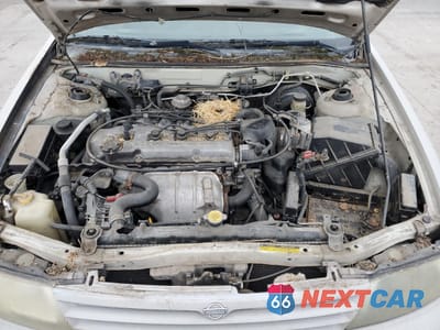 Zdjęcie 11 z 12 samochodu: 1995 NISSAN ALTIMA XE VIN:1N4BU31D5SC184567 - miniatura