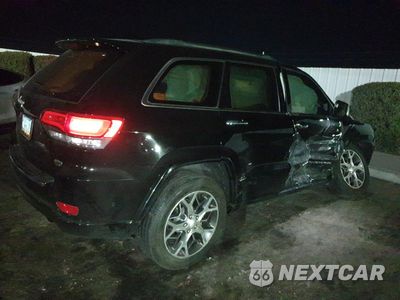Trzecie zdjęcie samochodu z tyłu: 2019 JEEP GRAND CHEROKEE OVERLAND VIN:1C4RJECG5KC597142 - miniatura