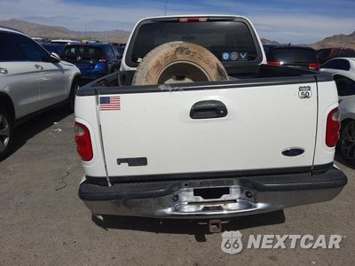 Zdjęcie 6 z 12 samochodu: 2002 FORD F150 SUPERCREW VIN:1FTRW08L02KE04346 - miniatura