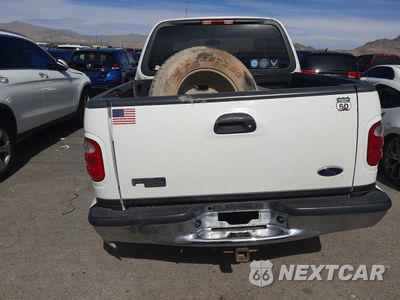 Zdjęcie 6 z 12 samochodu: 2002 FORD F150 SUPERCREW VIN:1FTRW08L02KE04346 - miniatura