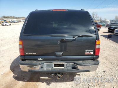 Zdjęcie 6 z 14 samochodu: 2003 GMC YUKON VIN:1GKEC13Z83R297813 - miniatura