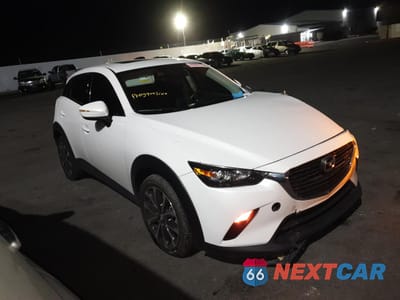 Czwarte zdjęcie samochodu z boku: 2019 MAZDA CX-3 TOURING VIN:JM1DKFC77K0450190 - miniatura