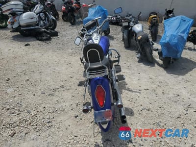 Czwarte zdjęcie samochodu z boku: 2006 HONDA VTX1300 R VIN:1HFSC52616A302095 - miniatura