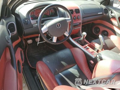 Zdjęcie 8 z 12 samochodu: 2006 PONTIAC GTO VIN:6G2VX12U36L549469 - miniatura