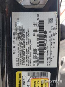 Zdjęcie 14 z 14 samochodu: 2016 FORD FUSION TITANIUM VIN:3FA6P0K9XGR228430 - miniatura