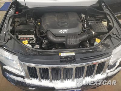 Zdjęcie 14 z 15 samochodu: 2013 JEEP GRAND CHEROKEE LAREDO VIN:1C4RJFAG6DC618513 - miniatura