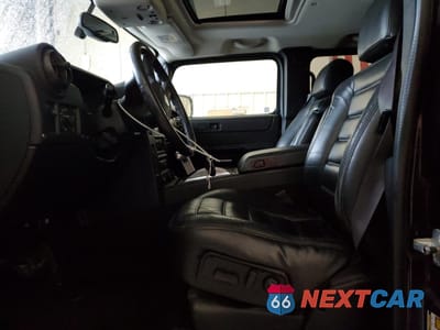 Zdjęcie 7 z 15 samochodu: 2005 HUMMER H2 VIN:5GRGN23UX5H120888 - miniatura