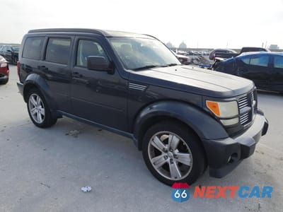 Czwarte zdjęcie samochodu z boku: 2011 DODGE NITRO HEAT VIN:1D4PT4GK2BW576387 - miniatura