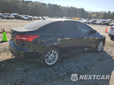 Trzecie zdjęcie samochodu z tyłu: 2016 FORD FOCUS SE VIN:1FADP3F22GL355161 - miniatura