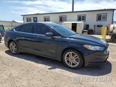 Czwarte zdjęcie samochodu z boku: 2018 FORD FUSION SE HYBRID VIN:3FA6P0LU0JR117167 - miniatura