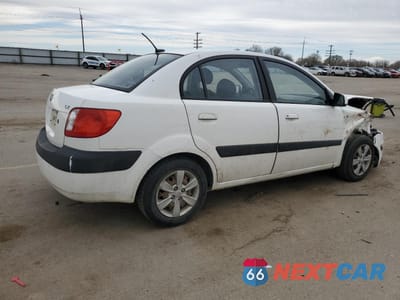 Trzecie zdjęcie samochodu z tyłu: 2009 KIA RIO BASE VIN:KNADE223996550181 - miniatura