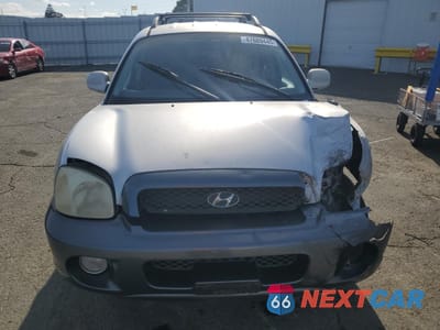 Piąte zdjęcie samochodu w środku: 2002 HYUNDAI SANTA FE GLS VIN:KM8SC13D82U324289 - miniatura