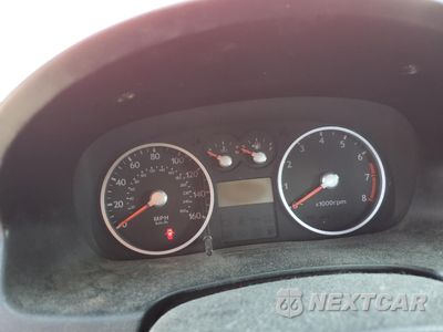 Zdjęcie 9 z 14 samochodu: 2004 HYUNDAI TIBURON VIN:KMHHM65D14U105288 - miniatura