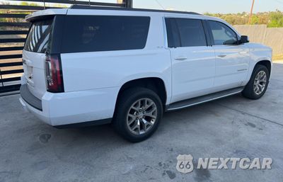 Czwarte zdjęcie samochodu z boku: 2016 GMC YUKON XL C VIN:1GKS1FKC4GR126775 - miniatura