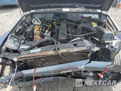 Zdjęcie 13 z 14 samochodu: 2001 JEEP CHEROKEE SPORT VIN:1J4FT48S71L611278 - miniatura