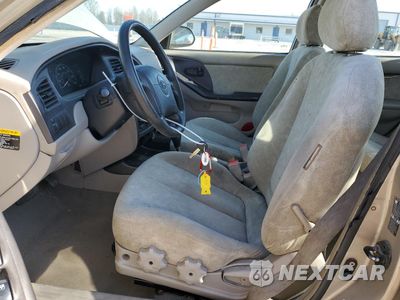 Zdjęcie 7 z 14 samochodu: 2002 HYUNDAI ELANTRA GLS VIN:KMHDN45D22U399216 - miniatura