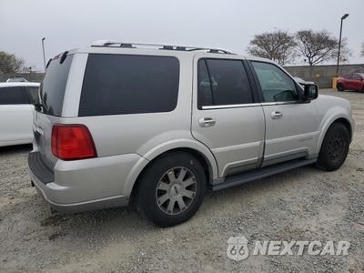 Trzecie zdjęcie samochodu z tyłu: 2004 LINCOLN NAVIGATOR VIN:5LMFU27RX4LJ05513 - miniatura