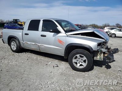 Czwarte zdjęcie samochodu z boku: 2007 DODGE DAKOTA QUAD SLT VIN:1D7HE48K07S117566 - miniatura