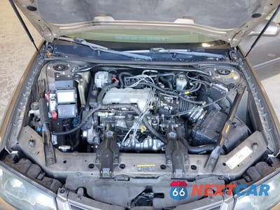 Zdjęcie 11 z 12 samochodu: 2002 CHEVROLET IMPALA VIN:2G1WF52E029325490 - miniatura