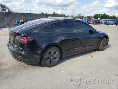 Trzecie zdjęcie samochodu z tyłu: 2018 TESLA MODEL 3 VIN:5YJ3E1EAXJF026551 - miniatura