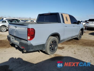Trzecie zdjęcie samochodu z tyłu: 2022 HONDA RIDGELINE BLACK EDITION VIN:5FPYK3F89NB032084 - miniatura