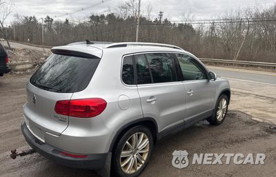 Czwarte zdjęcie samochodu z boku: 2012 VOLKSWAGEN TIGUAN S VIN:WVGBV7AX8CW608456 - miniatura