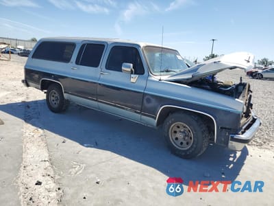 Czwarte zdjęcie samochodu z boku: 1989 CHEVROLET SUBURBAN R1500 VIN:1GNER16KXKFJ13326 - miniatura