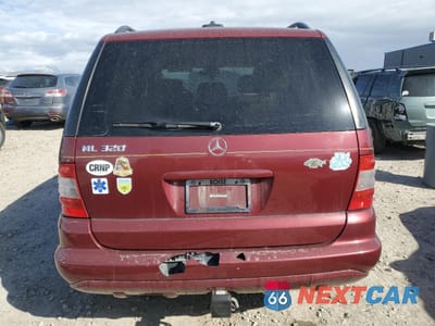 Zdjęcie 6 z 12 samochodu: 2002 MERCEDES-BENZ ML 320 VIN:4JGAB54E12A332085 - miniatura