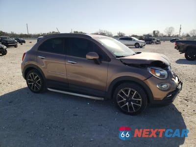 Czwarte zdjęcie samochodu z boku: 2017 FIAT 500X TREKKING VIN:ZFBCFXCB1HP610237 - miniatura