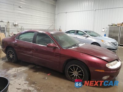 Czwarte zdjęcie samochodu z boku: 2001 OLDSMOBILE AURORA 4.0 VIN:1G3GS64C814122616 - miniatura