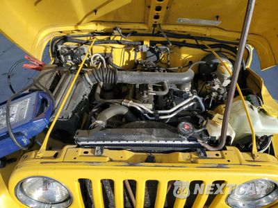 Zdjęcie 11 z 12 samochodu: 2004 JEEP WRANGER VIN:1J4FA49S34P707121 - miniatura
