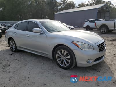 Czwarte zdjęcie samochodu z boku: 2014 INFINITI Q70 3.7 VIN:JN1BY1AP6EM260473 - miniatura