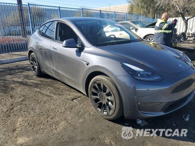 Czwarte zdjęcie samochodu z boku: 2023 TESLA MODEL Y VIN:7SAYGAEE1PF943487 - miniatura