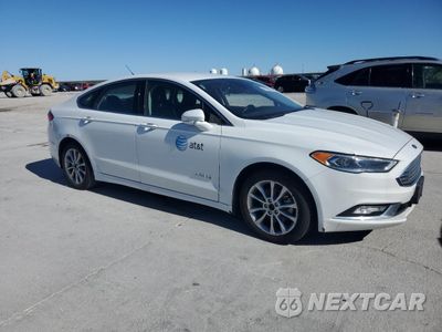 Czwarte zdjęcie samochodu z boku: 2017 FORD FUSION SE HYBRID VIN:3FA6P0LU3HR409261 - miniatura