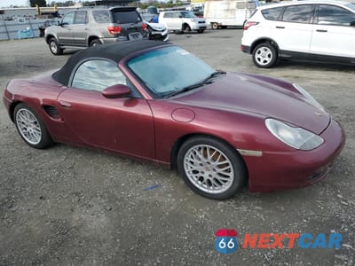 Czwarte zdjęcie samochodu z boku: 1999 PORSCHE BOXSTER VIN:WP0CA2984XU631531 - miniatura