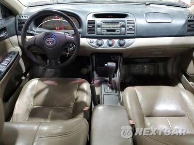 Zdjęcie 8 z 12 samochodu: 2003 TOYOTA CAMRY LE VIN:4T1BF32K83U052377 - miniatura
