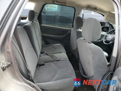 Zdjęcie 11 z 13 samochodu: 2004 MAZDA TRIBUTE LX VIN:4F2YZ041X4KM11363 - miniatura