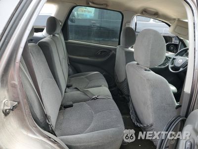 Zdjęcie 11 z 13 samochodu: 2004 MAZDA TRIBUTE LX VIN:4F2YZ041X4KM11363 - miniatura