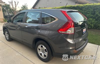 Trzecie zdjęcie samochodu z tyłu: 2013 HONDA CR-V LX VIN:3CZRM3H39DG711252 - miniatura