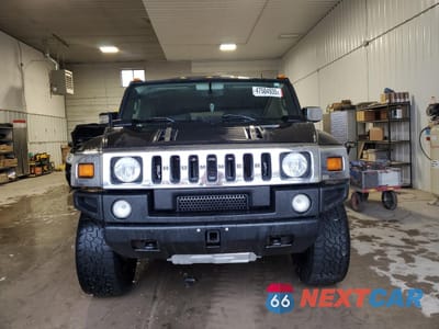 Piąte zdjęcie samochodu w środku: 2005 HUMMER H2 VIN:5GRGN23UX5H120888 - miniatura