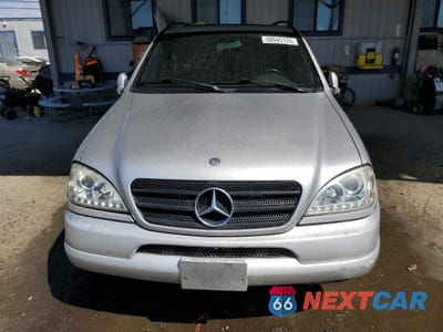 Piąte zdjęcie samochodu w środku: 2000 MERCEDES-BENZ ML 320 VIN:4JGAB54E3YA200180 - miniatura